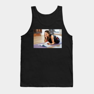 Young woman reading a yoga book Tank Top